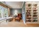Inviting sitting room with bookshelves, natural light, and comfortable seating at 1412 Lanier Ne Mnr, Atlanta, GA 30319