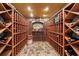 Custom wine cellar featuring extensive wooden racking for ample bottle storage and temperature control at 1412 Lanier Ne Mnr, Atlanta, GA 30319