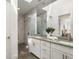Modern bathroom with double vanity, and glass-enclosed shower with dual shower heads at 241 Maynard Se Ter # 18, Atlanta, GA 30316