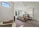 Bright main bedroom with a large window and plush carpet, alongside modern decor at 241 Maynard Se Ter # 18, Atlanta, GA 30316