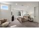Cozy bedroom with neutral tones, plush carpeting, a comfortable bed, and ample natural light at 241 Maynard Se Ter # 18, Atlanta, GA 30316