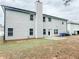 Spacious backyard with a patio and ample lawn space at 5584 Dendy Trce, Fairburn, GA 30213