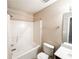 Well-maintained bathroom with combined shower and tub and white fixtures offer convenience at 5584 Dendy Trce, Fairburn, GA 30213