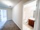 Bathroom with vanity, tile flooring, and shower/tub combo at 5584 Dendy Trce, Fairburn, GA 30213