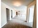 Hallway with neutral walls and carpet flooring at 5584 Dendy Trce, Fairburn, GA 30213