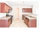 Spacious kitchen features modern appliances and ample counter space at 5584 Dendy Trce, Fairburn, GA 30213