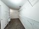 Large walk-in closet with shelving at 5584 Dendy Trce, Fairburn, GA 30213