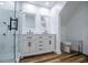 Modern bathroom featuring double sinks and a large, glass-enclosed shower at 277 Clearview Ct, Villa Rica, GA 30180