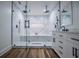 Modern bathroom featuring dual shower heads, glass doors and double sinks at 277 Clearview Ct, Villa Rica, GA 30180