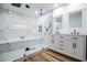 Modern bathroom featuring double sinks and a large, glass-enclosed shower at 277 Clearview Ct, Villa Rica, GA 30180