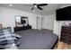 Spacious bedroom features a ceiling fan, a large mirror, and great natural light at 277 Clearview Ct, Villa Rica, GA 30180