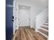 Bright foyer featuring wood floors and a staircase at 277 Clearview Ct, Villa Rica, GA 30180