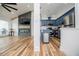 Open-concept kitchen with stainless steel appliances, island, and modern finishes at 277 Clearview Ct, Villa Rica, GA 30180