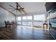This bright living room boasts hardwood floors and multiple windows with scenic outdoor views at 277 Clearview Ct, Villa Rica, GA 30180