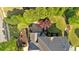 Overhead view of a well-maintained home with a cozy patio area and mature trees at 3265 Belmont Glen Se Dr, Marietta, GA 30067