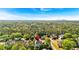 Overhead view featuring a home, lush trees, and surrounding neighborhood at 3265 Belmont Glen Se Dr, Marietta, GA 30067