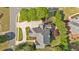 Overhead view of home displaying the landscaped grounds, patio area, and driveway at 3265 Belmont Glen Se Dr, Marietta, GA 30067