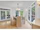 Dining area featuring hardwood floors, natural light, and views of the yard at 3265 Belmont Glen Se Dr, Marietta, GA 30067