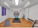 Home gym offers workout equipment and provides an in-home fitness and wellness space at 3265 Belmont Glen Se Dr, Marietta, GA 30067