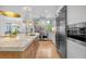 Bright kitchen featuring a large island, stainless steel appliances, and natural light at 3265 Belmont Glen Se Dr, Marietta, GA 30067