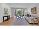 Bright living room with hardwood floors, neutral decor, and outdoor view at 3265 Belmont Glen Se Dr, Marietta, GA 30067