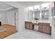 Main bathroom featuring dual vanities, a tiled floor, and plenty of counter space at 3265 Belmont Glen Se Dr, Marietta, GA 30067