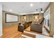Media room features tiered seating, a large projection screen and custom built-in cabinets at 3265 Belmont Glen Se Dr, Marietta, GA 30067