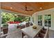 Inviting patio with comfortable seating and an outdoor dining area under a wood ceiling at 3265 Belmont Glen Se Dr, Marietta, GA 30067