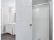 Bathroom featuring a shower-tub combo, new vanity with a large mirror, and modern lighting at 4872 Lewis Rd, Powder Springs, GA 30127