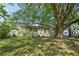 Well-maintained backyard with lush lawn and a large shade tree at 176 Nancy Se Dr, Marietta, GA 30067