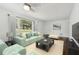 Comfortable living room with a large window and stylish contemporary furnishings at 176 Nancy Se Dr, Marietta, GA 30067