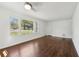 Bright, airy living room with hardwood floors and a large window that frames the outdoor scenery at 176 Nancy Se Dr, Marietta, GA 30067