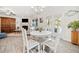 Bright dining area with natural light, and a sliding glass door leading to a patio area at 221 Hickory Bluffs Pkwy, Canton, GA 30114