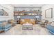 Inviting lobby area with stylish seating, decor, and shelves for display at 221 Hickory Bluffs Pkwy, Canton, GA 30114