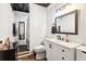Bathroom with a white vanity, modern fixtures, and a shower with a curtain at 2361 Mann Rd, Douglasville, GA 30134