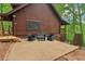 Cozy patio with stylish seating area and lush green surroundings at 2361 Mann Rd, Douglasville, GA 30134