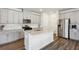 Modern kitchen featuring gray cabinets, granite countertops, stainless steel appliances and hardwood floors at 4389 Treadle Sw Rd, Mableton, GA 30126