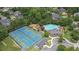 Aerial view of neighborhood amenities showcasing the tennis courts, playground, and swimming pool at 1342 Winborn Nw Cir, Kennesaw, GA 30152