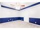 This is a bedroom with wainscotting and carpet with a ceiling fan at 1342 Winborn Nw Cir, Kennesaw, GA 30152