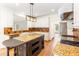 Well-equipped kitchen featuring granite countertops, stainless steel appliances, and custom cabinetry at 1342 Winborn Nw Cir, Kennesaw, GA 30152