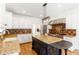 Gourmet kitchen featuring granite countertops, stainless steel appliances, and a central island at 1342 Winborn Nw Cir, Kennesaw, GA 30152