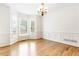 Bright dining room features hardwood floors, wainscoting, large windows and recessed lighting at 1342 Winborn Nw Cir, Kennesaw, GA 30152