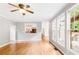 Well-lit living room featuring hardwood floors and a clear view of the outdoor patio at 1342 Winborn Nw Cir, Kennesaw, GA 30152