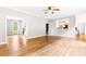 Open living room with hardwood floors connecting seamlessly to other spaces in the home at 1342 Winborn Nw Cir, Kennesaw, GA 30152