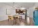 Eat-in kitchen boasts stainless appliances, granite counters, and stylish pendant lighting at 1365 Memorial Se Dr # 8, Atlanta, GA 30317