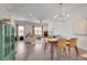 Open-concept living area with hardwood floors, modern chandelier, and comfortable seating at 1365 Memorial Se Dr # 8, Atlanta, GA 30317