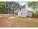 View of backyard featuring wooden deck, patio, and fenced yard at 2727 Northgate Nw Way, Acworth, GA 30101