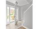 Inviting foyer featuring tiled flooring and abundant natural light, offering a warm welcome at 2727 Northgate Nw Way, Acworth, GA 30101