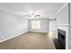 Bright living room boasting modern flooring, neutral paint, and an inviting fireplace at 2727 Northgate Nw Way, Acworth, GA 30101