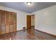 Bedroom with hardwood floors, and large closet at 3341 Rae Pl, Lawrenceville, GA 30044